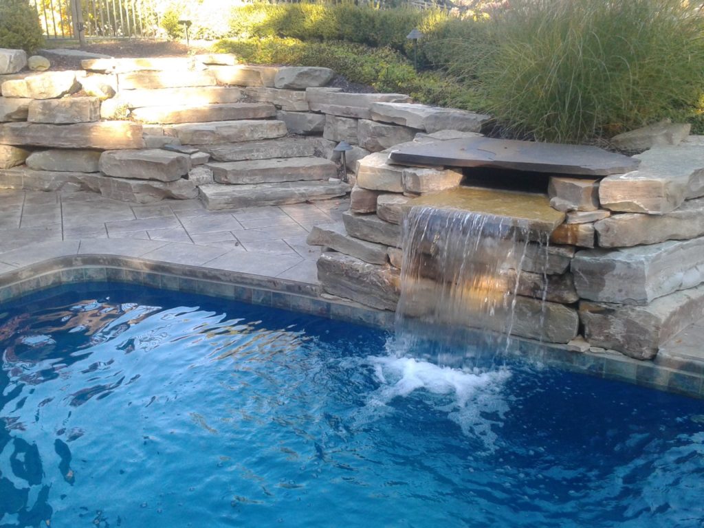 Latham fiberglass pool and landscaping project in Milford Michigan