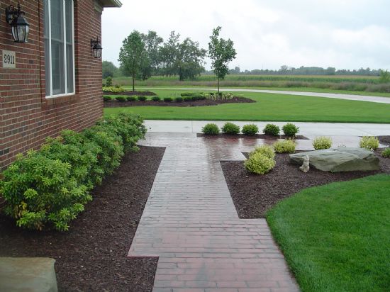 Stamped concrete sidewalk. 48357