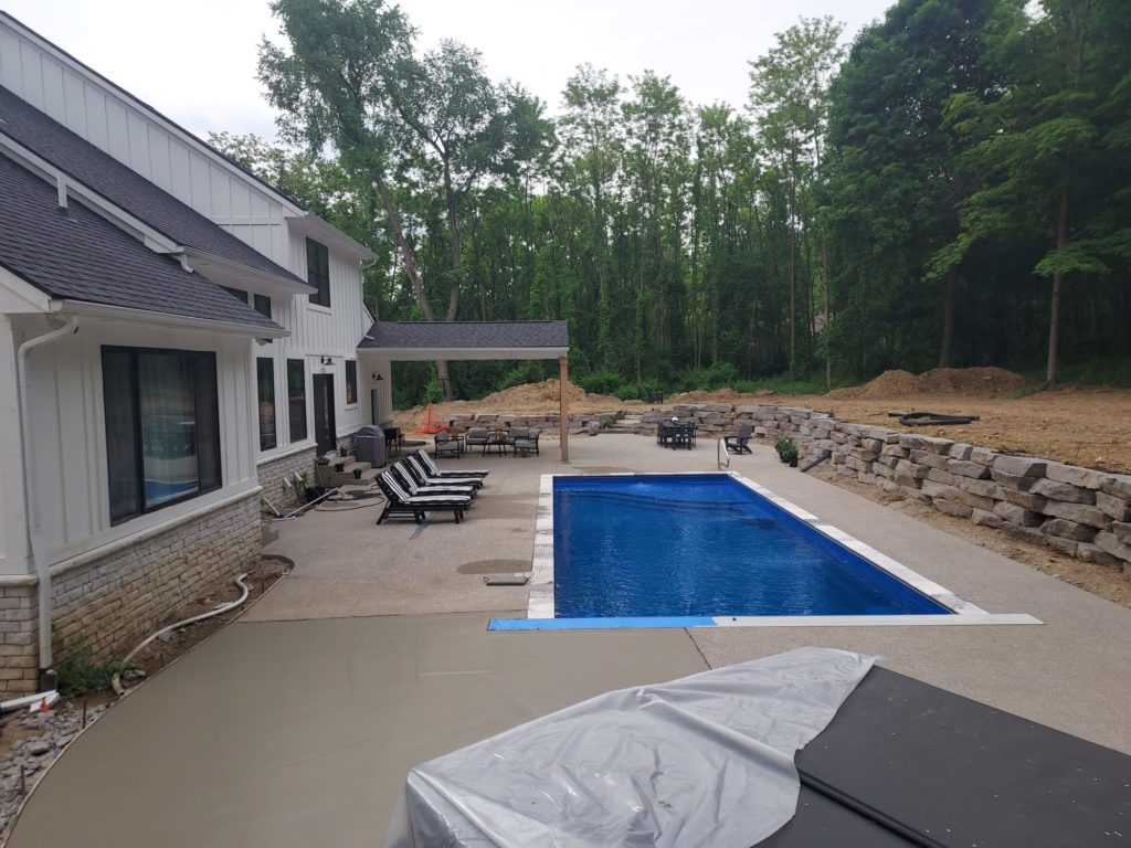 Exposed aggregate with Thursday fiberglass pool 48381